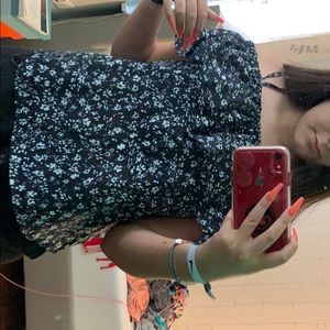 floral off the shoulder shirt.